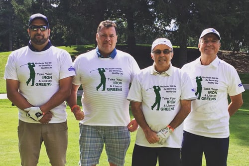Golfers carrying custom promo products including golf bags and wearing custom polo shirts.